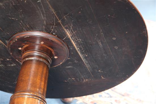 A George III mahogany revolving bookcase, circa 1820, H.4ft Diam.2ft 11in.